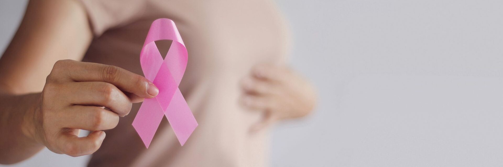 Breast Cancer Awareness: A common cancer in women, with symptoms like lumps, changes in breast shape, and skin alterations.