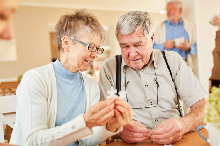 Older adult looking thoughtful with brain health icons — representing Alzheimer’s & dementia awareness