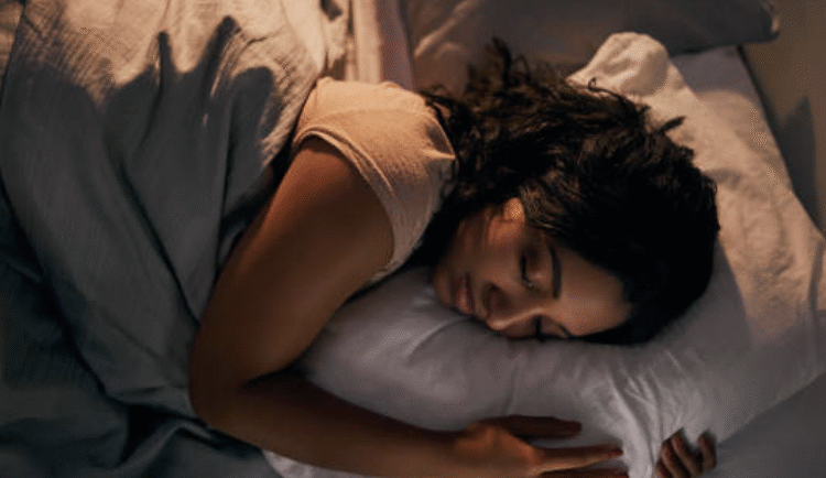 Peaceful woman sleeping, symbolizing VITACED CALMNIGHT® natural sleep aid – Cedem AG